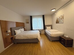 Akomo Bern