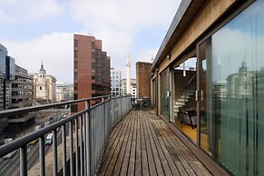 Monument by Excel Apartments