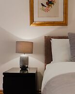 Monument by Excel Apartments