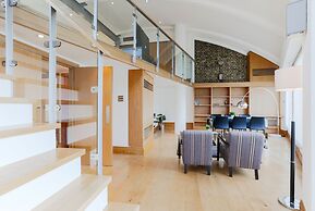 Monument by Excel Apartments