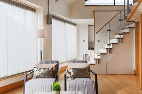 Monument by Excel Apartments