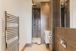 Monument by Excel Apartments