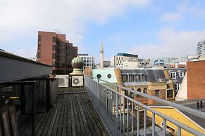 Monument by Excel Apartments