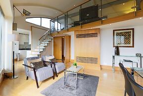 Monument by Excel Apartments