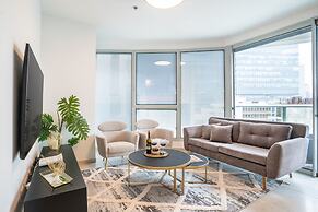 Sunlit Urban Escape with Balcony by Sea N Rent