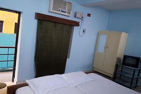 Parisha Residency - Temple Side Hotel