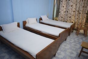 Parisha Residency - Temple Side Hotel