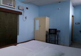 Parisha Residency - Temple Side Hotel