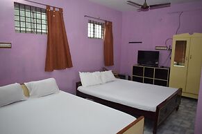 Parisha Residency - Temple Side Hotel