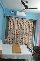 Parisha Residency - Temple Side Hotel