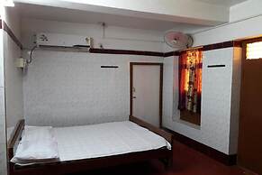 Parisha Residency - Temple Side Hotel