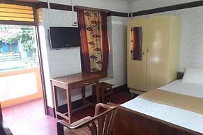 Parisha Residency - Temple Side Hotel