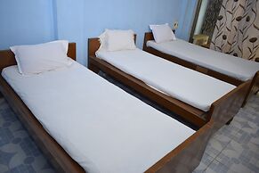 Parisha Residency - Temple Side Hotel