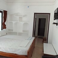 Parisha Residency - Temple Side Hotel