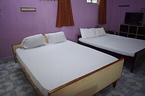 Parisha Residency - Temple Side Hotel