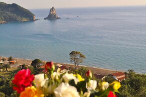 Corfu Beachfront Holiday Houses Yannis on Agios Gordios Beach