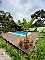 Casa com Piscina na Praia do Rosa