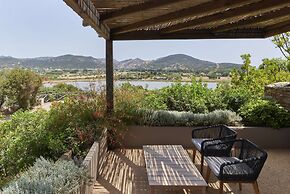 Baia di Chia Resort Sardinia, Curio Collection by Hilton