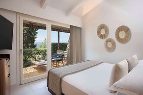 Baia di Chia Resort Sardinia, Curio Collection by Hilton