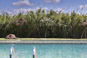 Baia di Chia Resort Sardinia, Curio Collection by Hilton