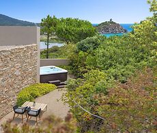 Baia di Chia Resort Sardinia, Curio Collection by Hilton