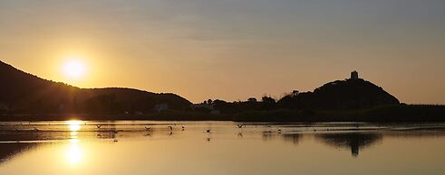 Baia di Chia Resort Sardinia, Curio Collection by Hilton