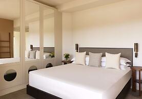 Baia di Chia Resort Sardinia, Curio Collection by Hilton