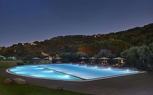 Baia di Chia Resort Sardinia, Curio Collection by Hilton