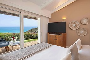 Baia di Chia Resort Sardinia, Curio Collection by Hilton