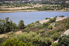 Baia di Chia Resort Sardinia, Curio Collection by Hilton
