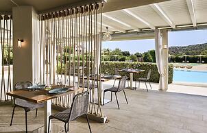 Baia di Chia Resort Sardinia, Curio Collection by Hilton