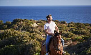 Baia di Chia Resort Sardinia, Curio Collection by Hilton