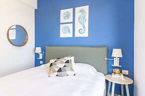 Sunlit Balcony & Coastal Charm by Sea N' Rent