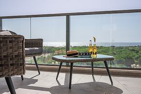 Sunlit Balcony & Coastal Charm by Sea N' Rent