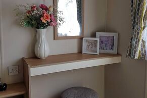 Pool-garden-2br-parking-wifi-sleeps6