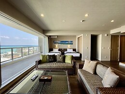 Coral Palace Onna by Sunset Avenue