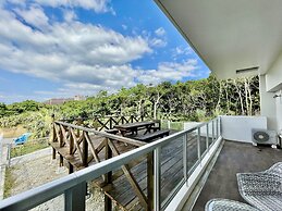 Coral Palace Onna by Sunset Avenue