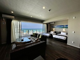 Coral Palace Onna by Sunset Avenue