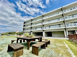 Coral Palace Onna by Sunset Avenue