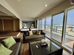 Coral Palace Onna by Sunset Avenue