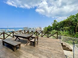 Coral Palace Onna by Sunset Avenue