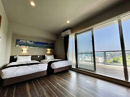 Coral Palace Onna by Sunset Avenue