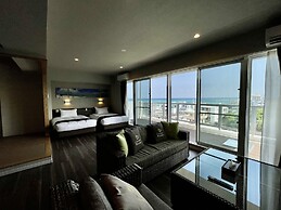 Coral Palace Onna by Sunset Avenue