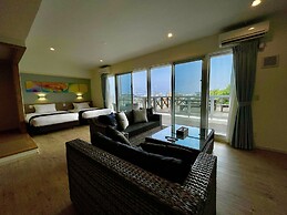 Coral Palace Onna by Sunset Avenue