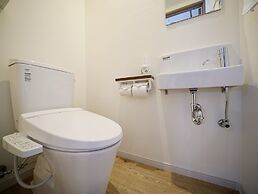 Coral Palace Onna by Sunset Avenue