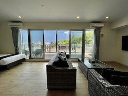 Coral Palace Onna by Sunset Avenue