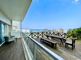 Coral Palace Onna by Sunset Avenue