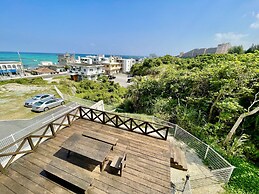 Coral Palace Onna by Sunset Avenue