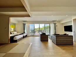 Coral Palace Onna by Sunset Avenue