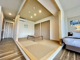 Coral Palace Onna by Sunset Avenue